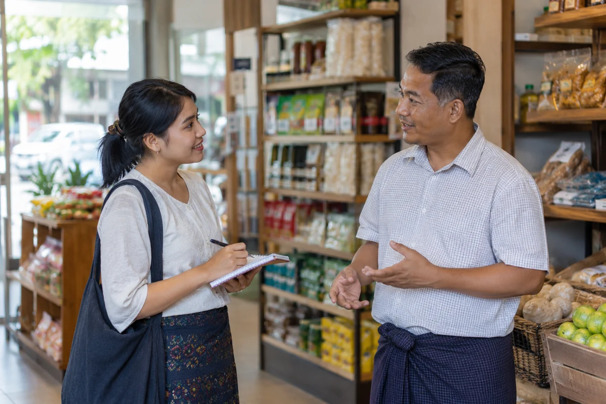 店舗で聞き取り調査を行う様子
